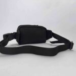 Padded back New Moon hipbag in black, blue, orange on a white background