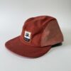 CorduroyCap_RockPink_side Side of the Corduroy Cap in rock pink colourway on a white background